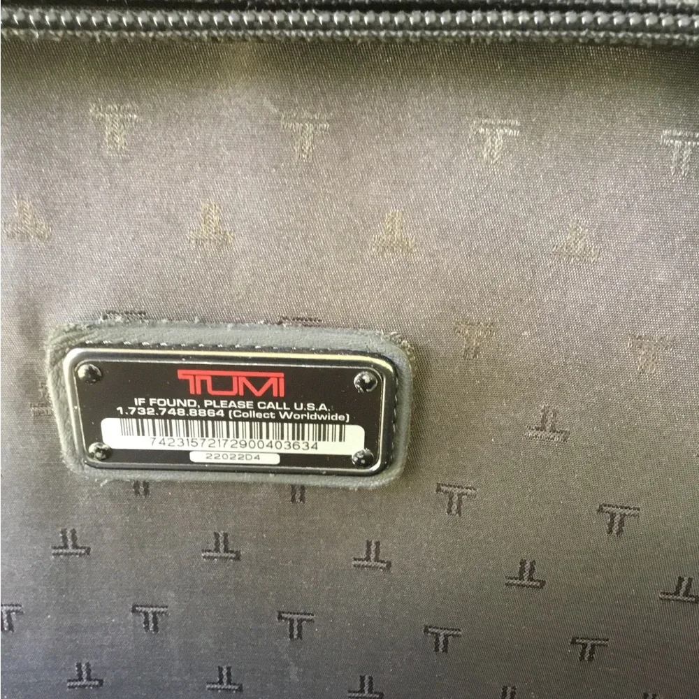 Tumi Black Men's Rolling Carry-On Travel Bag